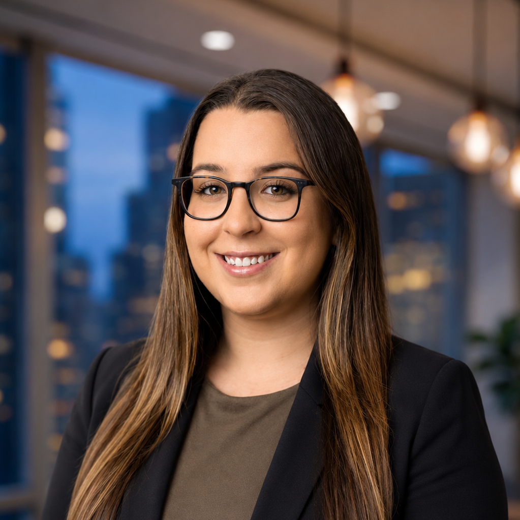 Smiling professional woman with glasses in office